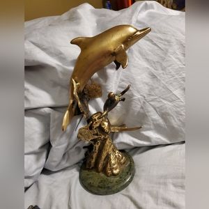 A San Pacific International Brass Sculpture